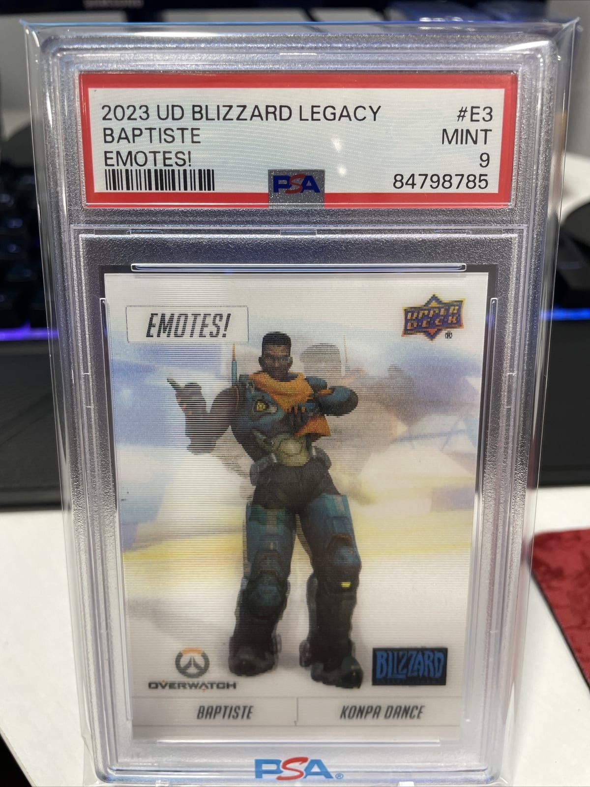 2023 Blizzard Legacy #E-3 Baptiste Emotes Konpa Dance PSA 9, photo
